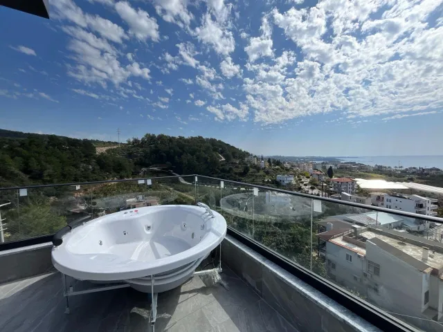 <p>Siberia Villas, situated in the picturesque Incekum District of Alanya, offer a luxurious living experience just 550 meters away from the serene sea.<br />
<br />
The project comprises three beautifully designed villas, each featuring its own private swimming pool.<br />
<br />
Additional amenities include an open car park, a spacious barbecue area, and well-maintained green spaces.<br />
<br />
The villas are available in two types: 4+2 villas, spanning 380 square meters, and a more spacious 5+2 villa with 460 square meters of living space.<br />
<br />
The construction of these magnificent homes is set to commence on May 30th, 2022, with an anticipated completion date of December 30th, 2023.</p>
