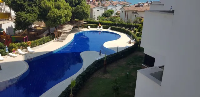 <p><strong>Project Name:Liparsi Sunset (Arpa&ccedil;bahşiş)</strong></p>

<p><strong>Our project, which is established on 7.956.91 M2 Green area, consists of 2 blocks and 196 apartments.&nbsp;Our project has 16 floors and there are 6-8 apartments on each floor.</strong></p>

<p><strong>Outdoor Features</strong></p>

<p><strong>∙&nbsp;&nbsp;&nbsp;&nbsp;&nbsp;&nbsp;&nbsp;&nbsp;Central Satellite</strong></p>

<p><strong>∙&nbsp;&nbsp;&nbsp;&nbsp;&nbsp;&nbsp;&nbsp;&nbsp;Central Solar Water Heater</strong></p>

<p><strong>∙&nbsp;&nbsp;&nbsp;&nbsp;&nbsp;&nbsp;&nbsp;&nbsp;Fully Equipped Generator</strong></p>

<p><strong>∙&nbsp;&nbsp;&nbsp;&nbsp;&nbsp;&nbsp;&nbsp;&nbsp;Outdoor Car Park</strong></p>

<p><strong>∙&nbsp;&nbsp;&nbsp;&nbsp;&nbsp;&nbsp;&nbsp;&nbsp;Photocell Building Entrance</strong></p>

<p><strong>∙&nbsp;&nbsp;&nbsp;&nbsp;&nbsp;&nbsp;&nbsp;&nbsp;Full Automatic 2 Elevators</strong></p>

<p><strong>Interior Features</strong></p>

<p><strong>∙&nbsp;&nbsp;&nbsp;&nbsp;&nbsp;&nbsp;&nbsp;&nbsp;Apartments 1+1 - 73/75 M2 / 2+1-95/105 M2</strong></p>

<p><strong>∙&nbsp;&nbsp;&nbsp;&nbsp;&nbsp;&nbsp;&nbsp;&nbsp;Air Conditioning Installation Collection Area</strong></p>

<p><strong>∙&nbsp;&nbsp;&nbsp;&nbsp;&nbsp;&nbsp;&nbsp;&nbsp;Entrance Door Steel Door</strong></p>

<p><strong>∙&nbsp;&nbsp;&nbsp;&nbsp;&nbsp;&nbsp;&nbsp;&nbsp;Special Design Cloakroom</strong></p>

<p><strong>∙&nbsp;&nbsp;&nbsp;&nbsp;&nbsp;&nbsp;&nbsp;&nbsp;Special Design Interior Doors</strong></p>

<p><strong>∙&nbsp;&nbsp;&nbsp;&nbsp;&nbsp;&nbsp;&nbsp;&nbsp;Wet Floors 1st Class Ceramic and Granite</strong></p>

<p><strong>∙&nbsp;&nbsp;&nbsp;&nbsp;&nbsp;&nbsp;&nbsp;&nbsp;Pvc Joinery (Double Glass-Insulating Glass)</strong></p>

<p><strong>∙&nbsp;&nbsp;&nbsp;&nbsp;&nbsp;&nbsp;&nbsp;&nbsp;Interior Doors Special Design</strong></p>

<p><strong>∙&nbsp;&nbsp;&nbsp;&nbsp;&nbsp;&nbsp;&nbsp;&nbsp;Space-Appropriate MDF Kitchen Cabinets</strong></p>

<p><strong>∙&nbsp;&nbsp;&nbsp;&nbsp;&nbsp;&nbsp;&nbsp;&nbsp;Granite Countertops</strong></p>

<p><strong>∙&nbsp;&nbsp;&nbsp;&nbsp;&nbsp;&nbsp;&nbsp;&nbsp;Custom Design Laundry Cabinet</strong></p>

<p><strong>∙&nbsp;&nbsp;&nbsp;&nbsp;&nbsp;&nbsp;&nbsp;&nbsp;2 Pcs Special Design Bathroom Cabinet</strong></p>

<p><strong>∙&nbsp;&nbsp;&nbsp;&nbsp;&nbsp;&nbsp;&nbsp;&nbsp;General Wc General Bathroom And En-Suite Bathroom</strong></p>

<p><strong>∙&nbsp;&nbsp;&nbsp;&nbsp;&nbsp;&nbsp;&nbsp;&nbsp;Shower</strong></p>

<p><strong>∙&nbsp;&nbsp;&nbsp;&nbsp;&nbsp;&nbsp;&nbsp;&nbsp;Chrome Balcony Railings Glass Plated Square Handrail</strong></p>

<p><strong>Social Areas</strong></p>

<p><strong>∙&nbsp;&nbsp;&nbsp;&nbsp;&nbsp;&nbsp;&nbsp;&nbsp;Outdoor Fitness</strong></p>

<p><strong>∙&nbsp;&nbsp;&nbsp;&nbsp;&nbsp;&nbsp;&nbsp;&nbsp;Outdoor Pool</strong></p>

<p><strong>∙&nbsp;&nbsp;&nbsp;&nbsp;&nbsp;&nbsp;&nbsp;&nbsp;Aqua Park</strong></p>

<p><strong>∙&nbsp;&nbsp;&nbsp;&nbsp;&nbsp;&nbsp;&nbsp;&nbsp;Camellias</strong></p>

<p><strong>∙&nbsp;&nbsp;&nbsp;&nbsp;&nbsp;&nbsp;&nbsp;&nbsp;BBQ Areas</strong></p>

<p><strong>∙&nbsp;&nbsp;&nbsp;&nbsp;&nbsp;&nbsp;&nbsp;&nbsp;Children's Playground</strong></p>

<p><strong>∙&nbsp;&nbsp;&nbsp;&nbsp;&nbsp;&nbsp;&nbsp;&nbsp;Jogging Paths</strong></p>

<p><strong>Security Features</strong></p>

<p><strong>∙&nbsp;&nbsp;&nbsp;&nbsp;&nbsp;&nbsp;&nbsp;&nbsp;Earthquake Regulation</strong></p>

<p><strong>∙&nbsp;&nbsp;&nbsp;&nbsp;&nbsp;&nbsp;&nbsp;&nbsp;7/24 Private Security</strong></p>

<p><strong>∙&nbsp;&nbsp;&nbsp;&nbsp;&nbsp;&nbsp;&nbsp;&nbsp;Fotoselli Site Entrance Gate</strong></p>

<p><strong>∙&nbsp;&nbsp;&nbsp;&nbsp;&nbsp;&nbsp;&nbsp;&nbsp;Bored pile</strong></p>

<p><strong>∙&nbsp;&nbsp;&nbsp;&nbsp;&nbsp;&nbsp;&nbsp;&nbsp;Fire Escapes</strong></p>

<p><strong>∙&nbsp;&nbsp;&nbsp;&nbsp;&nbsp;&nbsp;&nbsp;&nbsp;Central Camera System</strong></p>

<p><br />
&nbsp;</p>
