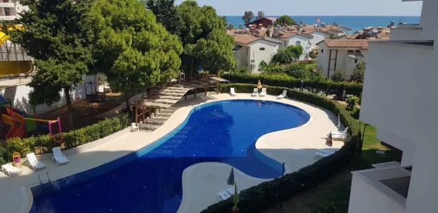 <p><strong>Project Name:Liparsi Sunset (Arpa&ccedil;bahşiş)</strong></p>

<p><strong>Our project, which is established on 7.956.91 M2 Green area, consists of 2 blocks and 196 apartments.&nbsp;Our project has 16 floors and there are 6-8 apartments on each floor.</strong></p>

<p><strong>Outdoor Features</strong></p>

<p><strong>∙&nbsp;&nbsp;&nbsp;&nbsp;&nbsp;&nbsp;&nbsp;&nbsp;Central Satellite</strong></p>

<p><strong>∙&nbsp;&nbsp;&nbsp;&nbsp;&nbsp;&nbsp;&nbsp;&nbsp;Central Solar Water Heater</strong></p>

<p><strong>∙&nbsp;&nbsp;&nbsp;&nbsp;&nbsp;&nbsp;&nbsp;&nbsp;Fully Equipped Generator</strong></p>

<p><strong>∙&nbsp;&nbsp;&nbsp;&nbsp;&nbsp;&nbsp;&nbsp;&nbsp;Outdoor Car Park</strong></p>

<p><strong>∙&nbsp;&nbsp;&nbsp;&nbsp;&nbsp;&nbsp;&nbsp;&nbsp;Photocell Building Entrance</strong></p>

<p><strong>∙&nbsp;&nbsp;&nbsp;&nbsp;&nbsp;&nbsp;&nbsp;&nbsp;Full Automatic 2 Elevators</strong></p>

<p><strong>Interior Features</strong></p>

<p><strong>∙&nbsp;&nbsp;&nbsp;&nbsp;&nbsp;&nbsp;&nbsp;&nbsp;Apartments 1+1 - 73/75 M2 / 2+1-95/105 M2</strong></p>

<p><strong>∙&nbsp;&nbsp;&nbsp;&nbsp;&nbsp;&nbsp;&nbsp;&nbsp;Air Conditioning Installation Collection Area</strong></p>

<p><strong>∙&nbsp;&nbsp;&nbsp;&nbsp;&nbsp;&nbsp;&nbsp;&nbsp;Entrance Door Steel Door</strong></p>

<p><strong>∙&nbsp;&nbsp;&nbsp;&nbsp;&nbsp;&nbsp;&nbsp;&nbsp;Special Design Cloakroom</strong></p>

<p><strong>∙&nbsp;&nbsp;&nbsp;&nbsp;&nbsp;&nbsp;&nbsp;&nbsp;Special Design Interior Doors</strong></p>

<p><strong>∙&nbsp;&nbsp;&nbsp;&nbsp;&nbsp;&nbsp;&nbsp;&nbsp;Wet Floors 1st Class Ceramic and Granite</strong></p>

<p><strong>∙&nbsp;&nbsp;&nbsp;&nbsp;&nbsp;&nbsp;&nbsp;&nbsp;Pvc Joinery (Double Glass-Insulating Glass)</strong></p>

<p><strong>∙&nbsp;&nbsp;&nbsp;&nbsp;&nbsp;&nbsp;&nbsp;&nbsp;Interior Doors Special Design</strong></p>

<p><strong>∙&nbsp;&nbsp;&nbsp;&nbsp;&nbsp;&nbsp;&nbsp;&nbsp;Space-Appropriate MDF Kitchen Cabinets</strong></p>

<p><strong>∙&nbsp;&nbsp;&nbsp;&nbsp;&nbsp;&nbsp;&nbsp;&nbsp;Granite Countertops</strong></p>

<p><strong>∙&nbsp;&nbsp;&nbsp;&nbsp;&nbsp;&nbsp;&nbsp;&nbsp;Custom Design Laundry Cabinet</strong></p>

<p><strong>∙&nbsp;&nbsp;&nbsp;&nbsp;&nbsp;&nbsp;&nbsp;&nbsp;2 Pcs Special Design Bathroom Cabinet</strong></p>

<p><strong>∙&nbsp;&nbsp;&nbsp;&nbsp;&nbsp;&nbsp;&nbsp;&nbsp;General Wc General Bathroom And En-Suite Bathroom</strong></p>

<p><strong>∙&nbsp;&nbsp;&nbsp;&nbsp;&nbsp;&nbsp;&nbsp;&nbsp;Shower</strong></p>

<p><strong>∙&nbsp;&nbsp;&nbsp;&nbsp;&nbsp;&nbsp;&nbsp;&nbsp;Chrome Balcony Railings Glass Plated Square Handrail</strong></p>

<p><strong>Social Areas</strong></p>

<p><strong>∙&nbsp;&nbsp;&nbsp;&nbsp;&nbsp;&nbsp;&nbsp;&nbsp;Outdoor Fitness</strong></p>

<p><strong>∙&nbsp;&nbsp;&nbsp;&nbsp;&nbsp;&nbsp;&nbsp;&nbsp;Outdoor Pool</strong></p>

<p><strong>∙&nbsp;&nbsp;&nbsp;&nbsp;&nbsp;&nbsp;&nbsp;&nbsp;Aqua Park</strong></p>

<p><strong>∙&nbsp;&nbsp;&nbsp;&nbsp;&nbsp;&nbsp;&nbsp;&nbsp;Camellias</strong></p>

<p><strong>∙&nbsp;&nbsp;&nbsp;&nbsp;&nbsp;&nbsp;&nbsp;&nbsp;BBQ Areas</strong></p>

<p><strong>∙&nbsp;&nbsp;&nbsp;&nbsp;&nbsp;&nbsp;&nbsp;&nbsp;Children's Playground</strong></p>

<p><strong>∙&nbsp;&nbsp;&nbsp;&nbsp;&nbsp;&nbsp;&nbsp;&nbsp;Jogging Paths</strong></p>

<p><strong>Security Features</strong></p>

<p><strong>∙&nbsp;&nbsp;&nbsp;&nbsp;&nbsp;&nbsp;&nbsp;&nbsp;Earthquake Regulation</strong></p>

<p><strong>∙&nbsp;&nbsp;&nbsp;&nbsp;&nbsp;&nbsp;&nbsp;&nbsp;7/24 Private Security</strong></p>

<p><strong>∙&nbsp;&nbsp;&nbsp;&nbsp;&nbsp;&nbsp;&nbsp;&nbsp;Fotoselli Site Entrance Gate</strong></p>

<p><strong>∙&nbsp;&nbsp;&nbsp;&nbsp;&nbsp;&nbsp;&nbsp;&nbsp;Bored pile</strong></p>

<p><strong>∙&nbsp;&nbsp;&nbsp;&nbsp;&nbsp;&nbsp;&nbsp;&nbsp;Fire Escapes</strong></p>

<p><strong>∙&nbsp;&nbsp;&nbsp;&nbsp;&nbsp;&nbsp;&nbsp;&nbsp;Central Camera System</strong></p>

<p><br />
&nbsp;</p>
