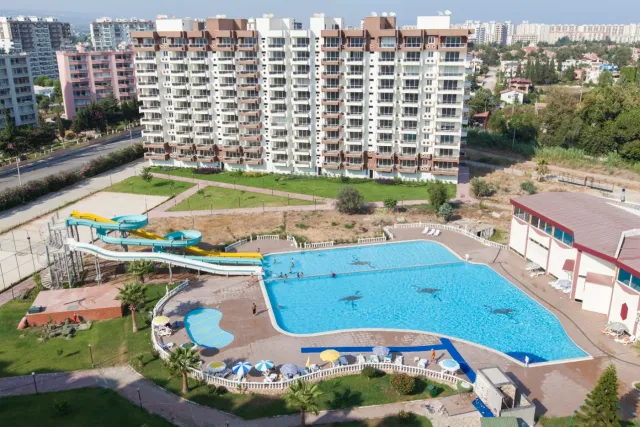 <p><strong>Project Name:Liparis Sunlife (Kargıpınarı)</strong></p>

<p><strong>Our project, which is built on 37.449.00 M2 Green area, consists of 12 blocks and 240 apartments.&nbsp;Our project has 10 floors and there are 2 apartments on each floor.</strong></p>

<p><strong>Outdoor Features</strong></p>

<p><strong>∙&nbsp;&nbsp;&nbsp;&nbsp;&nbsp;&nbsp;&nbsp;&nbsp;Central Satellite</strong></p>

<p><strong>∙&nbsp;&nbsp;&nbsp;&nbsp;&nbsp;&nbsp;&nbsp;&nbsp;Central Solar Water Heater</strong></p>

<p><strong>∙&nbsp;&nbsp;&nbsp;&nbsp;&nbsp;&nbsp;&nbsp;&nbsp;Fully Equipped Generator</strong></p>

<p><strong>∙&nbsp;&nbsp;&nbsp;&nbsp;&nbsp;&nbsp;&nbsp;&nbsp;Outdoor Car Park</strong></p>

<p><strong>∙&nbsp;&nbsp;&nbsp;&nbsp;&nbsp;&nbsp;&nbsp;&nbsp;Photocell Building Entrance</strong></p>

<p><strong>∙&nbsp;&nbsp;&nbsp;&nbsp;&nbsp;&nbsp;&nbsp;&nbsp;Full Automatic 2 Elevators</strong></p>

<p><strong>Interior Features</strong></p>

<p><strong>∙&nbsp;&nbsp;&nbsp;&nbsp;&nbsp;&nbsp;&nbsp;&nbsp;Apartments 2+1-115 M2 / 3+1-175M2</strong></p>

<p><strong>∙&nbsp;&nbsp;&nbsp;&nbsp;&nbsp;&nbsp;&nbsp;&nbsp;Air Conditioning Installation Collection Area</strong></p>

<p><strong>∙&nbsp;&nbsp;&nbsp;&nbsp;&nbsp;&nbsp;&nbsp;&nbsp;Entrance Door Steel Door</strong></p>

<p><strong>∙&nbsp;&nbsp;&nbsp;&nbsp;&nbsp;&nbsp;&nbsp;&nbsp;Special Design Cloakroom</strong></p>

<p><strong>∙&nbsp;&nbsp;&nbsp;&nbsp;&nbsp;&nbsp;&nbsp;&nbsp;Special Design Interior Doors</strong></p>

<p><strong>∙&nbsp;&nbsp;&nbsp;&nbsp;&nbsp;&nbsp;&nbsp;&nbsp;Wet Floors 1st Class Ceramic and Granite</strong></p>

<p><strong>∙&nbsp;&nbsp;&nbsp;&nbsp;&nbsp;&nbsp;&nbsp;&nbsp;Pvc Joinery (Double Glass-Insulating Glass)</strong></p>

<p><strong>∙&nbsp;&nbsp;&nbsp;&nbsp;&nbsp;&nbsp;&nbsp;&nbsp;Interior Doors Special Design</strong></p>

<p><strong>∙&nbsp;&nbsp;&nbsp;&nbsp;&nbsp;&nbsp;&nbsp;&nbsp;Space-Appropriate MDF Kitchen Cabinets</strong></p>

<p><strong>∙&nbsp;&nbsp;&nbsp;&nbsp;&nbsp;&nbsp;&nbsp;&nbsp;Granite Countertops</strong></p>

<p><strong>∙&nbsp;&nbsp;&nbsp;&nbsp;&nbsp;&nbsp;&nbsp;&nbsp;Custom Design Laundry Cabinet</strong></p>

<p><strong>∙&nbsp;&nbsp;&nbsp;&nbsp;&nbsp;&nbsp;&nbsp;&nbsp;2 Pcs Special Design Bathroom Cabinet</strong></p>

<p><strong>∙&nbsp;&nbsp;&nbsp;&nbsp;&nbsp;&nbsp;&nbsp;&nbsp;General Wc General Bathroom And En-Suite Bathroom</strong></p>

<p><strong>∙&nbsp;&nbsp;&nbsp;&nbsp;&nbsp;&nbsp;&nbsp;&nbsp;Shower</strong></p>

<p><strong>∙&nbsp;&nbsp;&nbsp;&nbsp;&nbsp;&nbsp;&nbsp;&nbsp;Chrome Balcony Railings Glass Plated Square Handrail</strong></p>

<p><strong>Social Areas</strong></p>

<p><strong>∙&nbsp;&nbsp;&nbsp;&nbsp;&nbsp;&nbsp;&nbsp;&nbsp;Seafront Location</strong></p>

<p><strong>∙&nbsp;&nbsp;&nbsp;&nbsp;&nbsp;&nbsp;&nbsp;&nbsp;Outdoor Fitness</strong></p>

<p><strong>∙&nbsp;&nbsp;&nbsp;&nbsp;&nbsp;&nbsp;&nbsp;&nbsp;Outdoor Pool</strong></p>

<p><strong>∙&nbsp;&nbsp;&nbsp;&nbsp;&nbsp;&nbsp;&nbsp;&nbsp;Aqua Park</strong></p>

<p><strong>∙&nbsp;&nbsp;&nbsp;&nbsp;&nbsp;&nbsp;&nbsp;&nbsp;Camellias</strong></p>

<p><strong>∙&nbsp;&nbsp;&nbsp;&nbsp;&nbsp;&nbsp;&nbsp;&nbsp;BBQ Areas</strong></p>

<p><strong>∙&nbsp;&nbsp;&nbsp;&nbsp;&nbsp;&nbsp;&nbsp;&nbsp;Children's Playground</strong></p>

<p><strong>∙&nbsp;&nbsp;&nbsp;&nbsp;&nbsp;&nbsp;&nbsp;&nbsp;Jogging Paths</strong></p>

<p><strong>Security Features</strong></p>

<p><strong>∙&nbsp;&nbsp;&nbsp;&nbsp;&nbsp;&nbsp;&nbsp;&nbsp;Earthquake Regulation</strong></p>

<p><strong>∙&nbsp;&nbsp;&nbsp;&nbsp;&nbsp;&nbsp;&nbsp;&nbsp;7/24 Private Security</strong></p>

<p><strong>∙&nbsp;&nbsp;&nbsp;&nbsp;&nbsp;&nbsp;&nbsp;&nbsp;Fotoselli Site Entrance Gate</strong></p>

<p><strong>∙&nbsp;&nbsp;&nbsp;&nbsp;&nbsp;&nbsp;&nbsp;&nbsp;Bored pile</strong></p>

<p><strong>∙&nbsp;&nbsp;&nbsp;&nbsp;&nbsp;&nbsp;&nbsp;&nbsp;Fire Escapes</strong></p>

<p><strong>∙&nbsp;&nbsp;&nbsp;&nbsp;&nbsp;&nbsp;&nbsp;&nbsp;Central Camera System</strong></p>

<p>&nbsp;</p>
