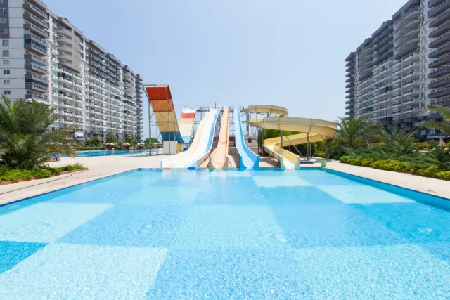 <p><strong>Project Name:Liparis Sunflowers 1 (&Ccedil;eşmeli)</strong></p>

<p><strong>Our project, which is built on 44.936.80 M2 Green area, consists of 22 blocks and 663 apartments.&nbsp;Our project has 15 floors and there are 2 apartments on each floor.</strong></p>

<p><strong>Outdoor Features</strong></p>

<p><strong>∙&nbsp;&nbsp;&nbsp;&nbsp;&nbsp;&nbsp;&nbsp;&nbsp;Central Satellite</strong></p>

<p><strong>∙&nbsp;&nbsp;&nbsp;&nbsp;&nbsp;&nbsp;&nbsp;&nbsp;Central Solar Water Heater</strong></p>

<p><strong>∙&nbsp;&nbsp;&nbsp;&nbsp;&nbsp;&nbsp;&nbsp;&nbsp;Fully Equipped Generator</strong></p>

<p><strong>∙&nbsp;&nbsp;&nbsp;&nbsp;&nbsp;&nbsp;&nbsp;&nbsp;Outdoor Car Park</strong></p>

<p><strong>∙&nbsp;&nbsp;&nbsp;&nbsp;&nbsp;&nbsp;&nbsp;&nbsp;Photocell Building Entrance</strong></p>

<p><strong>∙&nbsp;&nbsp;&nbsp;&nbsp;&nbsp;&nbsp;&nbsp;&nbsp;Full Automatic 2 Elevators</strong></p>

<p><strong>Interior Features</strong></p>

<p><strong>∙&nbsp;&nbsp;&nbsp;&nbsp;&nbsp;&nbsp;&nbsp;&nbsp;Apartments 2+1-120 M2 / 3+1-150/170/175M2</strong></p>

<p><strong>∙&nbsp;&nbsp;&nbsp;&nbsp;&nbsp;&nbsp;&nbsp;&nbsp;Air Conditioning Installation Collection Area</strong></p>

<p><strong>∙&nbsp;&nbsp;&nbsp;&nbsp;&nbsp;&nbsp;&nbsp;&nbsp;Entrance Door Steel Door</strong></p>

<p><strong>∙&nbsp;&nbsp;&nbsp;&nbsp;&nbsp;&nbsp;&nbsp;&nbsp;Special Design Cloakroom</strong></p>

<p><strong>∙&nbsp;&nbsp;&nbsp;&nbsp;&nbsp;&nbsp;&nbsp;&nbsp;Special Design Interior Doors</strong></p>

<p><strong>∙&nbsp;&nbsp;&nbsp;&nbsp;&nbsp;&nbsp;&nbsp;&nbsp;Wet Floors 1st Class Ceramic and Granite</strong></p>

<p><strong>∙&nbsp;&nbsp;&nbsp;&nbsp;&nbsp;&nbsp;&nbsp;&nbsp;Pvc Joinery (Double Glass-Insulating Glass)</strong></p>

<p><strong>∙&nbsp;&nbsp;&nbsp;&nbsp;&nbsp;&nbsp;&nbsp;&nbsp;Interior Doors Special Design</strong></p>

<p><strong>∙&nbsp;&nbsp;&nbsp;&nbsp;&nbsp;&nbsp;&nbsp;&nbsp;Space-Appropriate MDF Kitchen Cabinets</strong></p>

<p><strong>∙&nbsp;&nbsp;&nbsp;&nbsp;&nbsp;&nbsp;&nbsp;&nbsp;Granite Countertops</strong></p>

<p><strong>∙&nbsp;&nbsp;&nbsp;&nbsp;&nbsp;&nbsp;&nbsp;&nbsp;Custom Design Laundry Cabinet</strong></p>

<p><strong>∙&nbsp;&nbsp;&nbsp;&nbsp;&nbsp;&nbsp;&nbsp;&nbsp;2 Pcs Special Design Bathroom Cabinet</strong></p>

<p><strong>∙&nbsp;&nbsp;&nbsp;&nbsp;&nbsp;&nbsp;&nbsp;&nbsp;General Wc General Bathroom And En-Suite Bathroom</strong></p>

<p><strong>∙&nbsp;&nbsp;&nbsp;&nbsp;&nbsp;&nbsp;&nbsp;&nbsp;Shower</strong></p>

<p><strong>∙&nbsp;&nbsp;&nbsp;&nbsp;&nbsp;&nbsp;&nbsp;&nbsp;Chrome Balcony Railings Glass Plated Square Handrail</strong></p>

<p><strong>Social Areas</strong></p>

<p><strong>∙&nbsp;&nbsp;&nbsp;&nbsp;&nbsp;&nbsp;&nbsp;&nbsp;Turkish Bath / Steam Room</strong></p>

<p><strong>∙&nbsp;&nbsp;&nbsp;&nbsp;&nbsp;&nbsp;&nbsp;&nbsp;Salt Room &ndash; Sauna</strong></p>

<p><strong>∙&nbsp;&nbsp;&nbsp;&nbsp;&nbsp;&nbsp;&nbsp;&nbsp;Seafront Location</strong></p>

<p><strong>∙&nbsp;&nbsp;&nbsp;&nbsp;&nbsp;&nbsp;&nbsp;&nbsp;Outdoor Fitness</strong></p>

<p><strong>∙&nbsp;&nbsp;&nbsp;&nbsp;&nbsp;&nbsp;&nbsp;&nbsp;Indoor Fitness</strong></p>

<p><strong>∙&nbsp;&nbsp;&nbsp;&nbsp;&nbsp;&nbsp;&nbsp;&nbsp;Outdoor Pool</strong></p>

<p><strong>∙&nbsp;&nbsp;&nbsp;&nbsp;&nbsp;&nbsp;&nbsp;&nbsp;Aqua Park</strong></p>

<p><strong>∙&nbsp;&nbsp;&nbsp;&nbsp;&nbsp;&nbsp;&nbsp;&nbsp;Basketball Court</strong></p>

<p><strong>∙&nbsp;&nbsp;&nbsp;&nbsp;&nbsp;&nbsp;&nbsp;&nbsp;Tennis Court</strong></p>

<p><strong>∙&nbsp;&nbsp;&nbsp;&nbsp;&nbsp;&nbsp;&nbsp;&nbsp;Football Field</strong></p>

<p><strong>∙&nbsp;&nbsp;&nbsp;&nbsp;&nbsp;&nbsp;&nbsp;&nbsp;Camellias</strong></p>

<p><strong>∙&nbsp;&nbsp;&nbsp;&nbsp;&nbsp;&nbsp;&nbsp;&nbsp;BBQ Areas</strong></p>

<p><strong>∙&nbsp;&nbsp;&nbsp;&nbsp;&nbsp;&nbsp;&nbsp;&nbsp;Children's Playground</strong></p>

<p><strong>∙&nbsp;&nbsp;&nbsp;&nbsp;&nbsp;&nbsp;&nbsp;&nbsp;Jogging Paths</strong></p>

<p><strong>Security Features</strong></p>

<p><strong>∙&nbsp;&nbsp;&nbsp;&nbsp;&nbsp;&nbsp;&nbsp;&nbsp;Earthquake Regulation</strong></p>

<p><strong>∙&nbsp;&nbsp;&nbsp;&nbsp;&nbsp;&nbsp;&nbsp;&nbsp;7/24 Private Security</strong></p>

<p><strong>∙&nbsp;&nbsp;&nbsp;&nbsp;&nbsp;&nbsp;&nbsp;&nbsp;Fotoselli Site Entrance Gate</strong></p>

<p><strong>∙&nbsp;&nbsp;&nbsp;&nbsp;&nbsp;&nbsp;&nbsp;&nbsp;Bored pile</strong></p>

<p><strong>∙&nbsp;&nbsp;&nbsp;&nbsp;&nbsp;&nbsp;&nbsp;&nbsp;Fire Escapes</strong></p>

<p><strong>∙&nbsp;&nbsp;&nbsp;&nbsp;&nbsp;&nbsp;&nbsp;&nbsp;Central Camera System</strong></p>

<p>&nbsp;</p>
