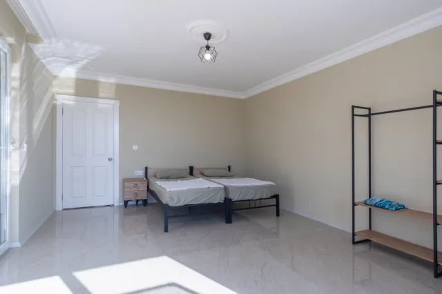 <p>Two magnificent new, fully equipped villas in Karkicak, Alanya. The villas are semi-detached and have a shared swimming pool. Each villa has 3 bedrooms and 1 living room. 380 m2 each villa. The total land area for the two villas is 680 m2. The balconies offer beautiful views of the entire city, mountain landscapes and the sea. You can buy 2 villas together - for one large family.</p>
