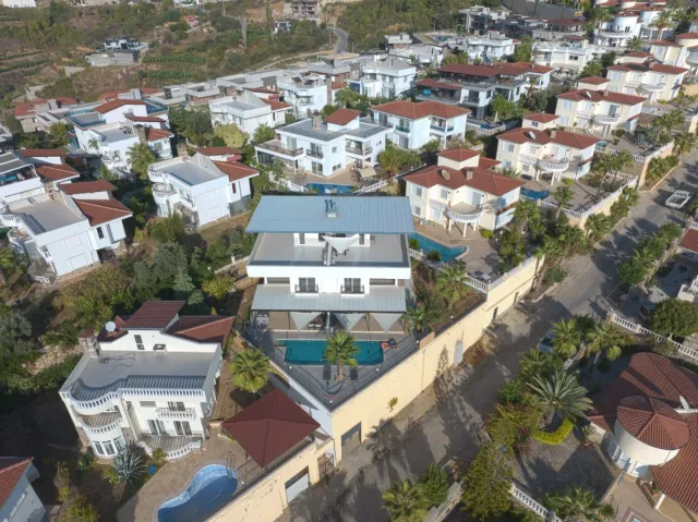 <p>Two magnificent new, fully equipped villas in Karkicak, Alanya. The villas are semi-detached and have a shared swimming pool. Each villa has 3 bedrooms and 1 living room. 380 m2 each villa. The total land area for the two villas is 680 m2. The balconies offer beautiful views of the entire city, mountain landscapes and the sea. You can buy 2 villas together - for one large family.</p>
