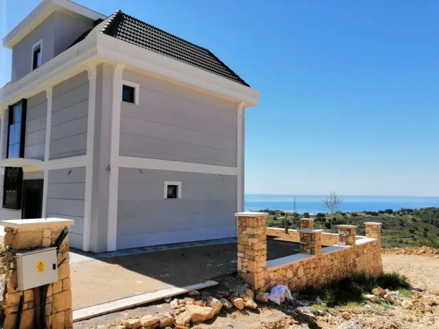 <p>New huge villa with panoramic views of the sea and green surroundings. Final construction work is underway and the new owner can choose the style and design - handrails for stairs, plumbing, lighting, you can equip a fitness room, sauna or dressing room. Each window offers panoramic sea views. The villa has a good area of land with young trees and a private pool. At the buyer's request, we can fully furnish the villa with new household appliances and furniture. The villa area is 400 m2, 3 floors, land area is 679 m2. When purchasing a villa, you can obtain citizenship.</p>
