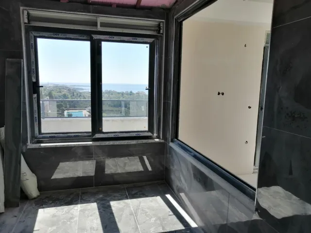 <p>New huge villa with panoramic views of the sea and green surroundings. Final construction work is underway and the new owner can choose the style and design - handrails for stairs, plumbing, lighting, you can equip a fitness room, sauna or dressing room. Each window offers panoramic sea views. The villa has a good area of land with young trees and a private pool. At the buyer's request, we can fully furnish the villa with new household appliances and furniture. The villa area is 400 m2, 3 floors, land area is 679 m2. When purchasing a villa, you can obtain citizenship.</p>
