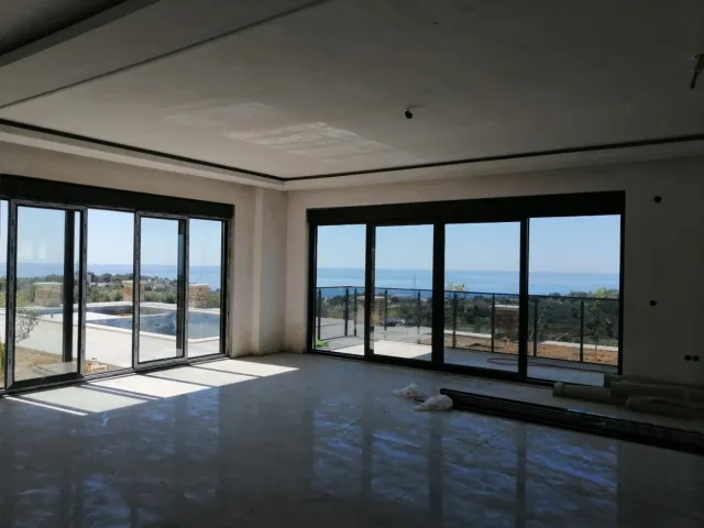 <p>New huge villa with panoramic views of the sea and green surroundings. Final construction work is underway and the new owner can choose the style and design - handrails for stairs, plumbing, lighting, you can equip a fitness room, sauna or dressing room. Each window offers panoramic sea views. The villa has a good area of land with young trees and a private pool. At the buyer's request, we can fully furnish the villa with new household appliances and furniture. The villa area is 400 m2, 3 floors, land area is 679 m2. When purchasing a villa, you can obtain citizenship.</p>
