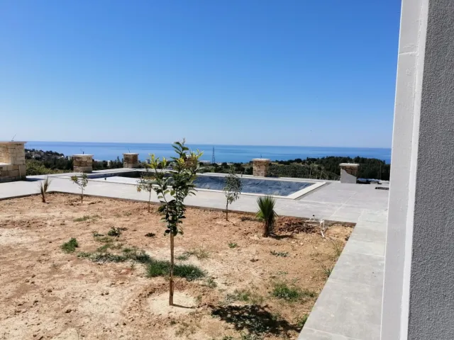 <p>New huge villa with panoramic views of the sea and green surroundings. Final construction work is underway and the new owner can choose the style and design - handrails for stairs, plumbing, lighting, you can equip a fitness room, sauna or dressing room. Each window offers panoramic sea views. The villa has a good area of land with young trees and a private pool. At the buyer's request, we can fully furnish the villa with new household appliances and furniture. The villa area is 400 m2, 3 floors, land area is 679 m2. When purchasing a villa, you can obtain citizenship.</p>
