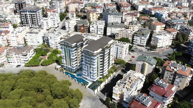 <p>Genesis Tower project is located in the palaces district of Alanya. It is 950 meters away from the world-famous Cleopatra beach. Additionally, with its location in the city, all your needs are within walking distance.</p>

<p>While the project construction continues, our flat sales continue.</p>

<p>The Genesis Tower project consists of 2 blocks of 9-storey buildings.</p>

<p>There are flats with 7 different square meters of area. 1+1, 2+1, 2+1 Duplex and 3+1 Duplex flat types are available.</p>
