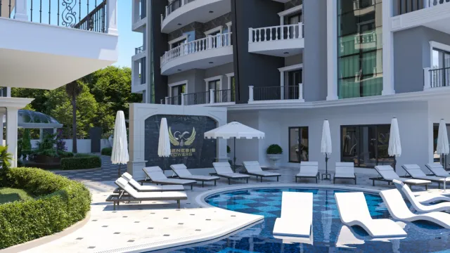 <p>Genesis Tower project is located in the palaces district of Alanya. It is 950 meters away from the world-famous Cleopatra beach. Additionally, with its location in the city, all your needs are within walking distance.</p>

<p>While the project construction continues, our flat sales continue.</p>

<p>The Genesis Tower project consists of 2 blocks of 9-storey buildings.</p>

<p>There are flats with 7 different square meters of area. 1+1, 2+1, 2+1 Duplex and 3+1 Duplex flat types are available.</p>
