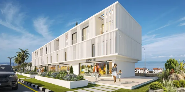 <p>Located in Esentepe, Northern Cyprus, this&nbsp; project is surrounded by stunning natural beauty, showcasing modern architecture and luxurious amenities.The buildings feature spacious terraces and elegant details that catch the eye. Interiors are flooded with natural light, creating comfortable living spaces.<br />
<br />
Retail spaces on the ground floor are designed to address the daily needs of both tourists and locals.<br />
<br />
The communal pool provides a refreshing oasis for relaxation. With a modern design, the pool area is surrounded by ample sunbathing space, allowing guests to enjoy sunbathing and socializing with friends in a delightful environment.<br />
Just steps from the beach, this project offers an excellent vacation experience with its white sand and turquoise waters. Available amenities include outdoor relaxation areas, sun loungers, and shaded spots, creating a unique lifestyle in Esentepe, where comfort seamlessly integrates with nature. With high-quality construction materials and thoughtfully designed living spaces, this project serves as a focal point for individuals of all ages. Its exceptional location and available amenities make it a perfect choice for both holiday retreats and permanent residences, providing significant value for investors.</p>
